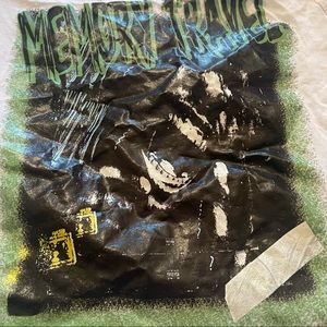 green and white graphic tee